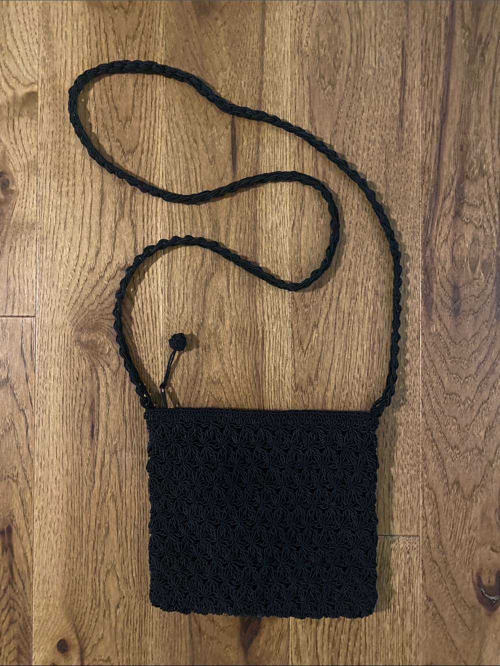 Women’s elegant woven black crossbody.
